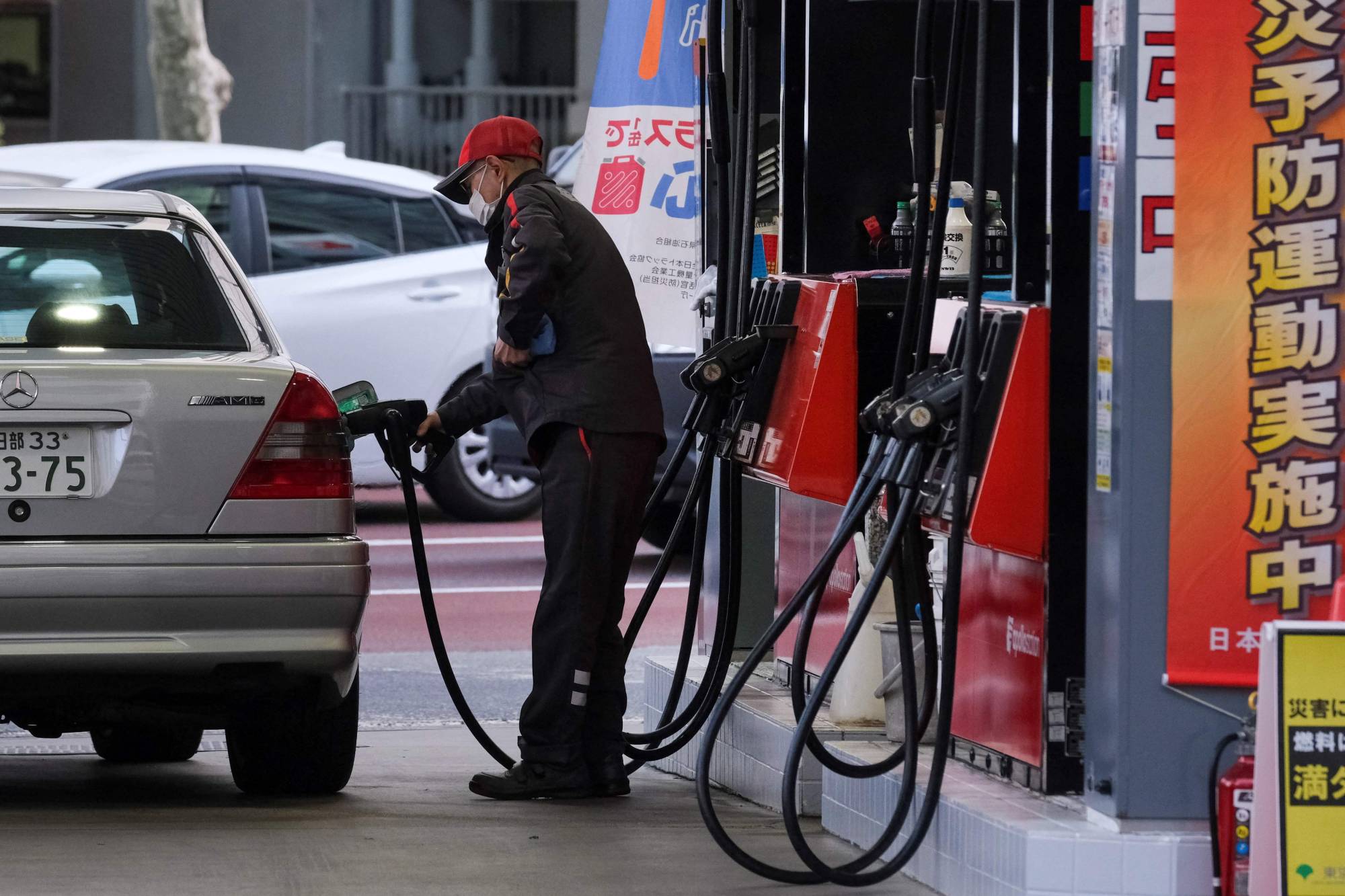 Surging energy prices and a weakening yen are likely to lead Japan's inflation rate to top 2% this year, economists say. | AFP-JIJI