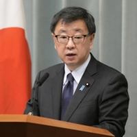 Chief Cabinet Secretary Hirokazu Matsuno speaks at a news conference on Tuesday. | KYODO