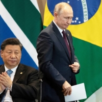 It appears Russian President Vladimir Putin likely obtained Chinese leader Xi Jinping\'s backing for his Ukraine adventure, a decision that may backfire on both Moscow and Beijing. | POOL VIA / REUTERS