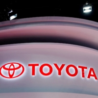Toyota Motor Corp. will make additional production cuts in March due to a shortage of semiconductor chips. | REUTERS