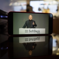 Masayoshi Son, chairman and chief executive officer of SoftBank Group Corp., speaks in Tokyo during a virtual earnings announcement in February. | BLOOMBERG