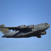 The U.S. has begun using one of its C-17 transport aircraft, similar to the one seen here, to ship military equipment from Japan to Ukraine. | REUTERS