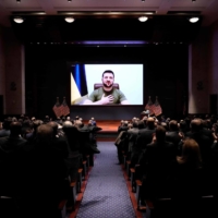 Ukrainian President Volodymyr Zelenskyy addresses the U.S. Congress by video link on Wednesday, appealing for tougher sanctions on Russia and more weapons to help his country. | AFP-JIJI