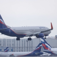 An Aeroflot Russian Airlines passenger plane lands at Sheremetyevo International Airport in Moscow on Saturday. Russian airlines have weeks to source alternative supplies of banned aircraft parts or start grounding jets to avoid safety concerns. | REUTERS