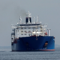 An oil tanker sails into New York Harbor on Friday as it arrives at the Port of New York and New Jersey following the Russian invasion of Ukraine. | REUTERS