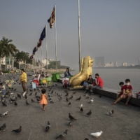 The waterfront along the Mekong River in Phnom Penh, on Jan. 29. Much of the population has no personal memory of the country’s deadliest years.  | NADIA SHIRA COHEN / THE NEW YORK TIMES