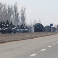 A view shows a convoy of pro-Russian troops during the Ukraine-Russia conflict outside the separatist-controlled town of Volnovakha in the Donetsk region of Ukraine on March 12. | REUTERS