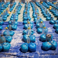 Bags of cassava flour and empty plastic bottles at a food distribution post run by the World Food Program in Madagascar.  | REUTERS
