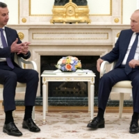 Russian President Vladimir Putin attends a meeting with Syrian President Bashar Assad at the Kremlin in Moscow on Sept. 13. | KREMLIN / VIA REUTERS  