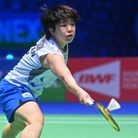 Akane Yamaguchi hits a return against An Se-young during the women\'s single\'s final at the All England Open Badminton Championship in Birmingham, England, on Sunday. | AFP-JIJI