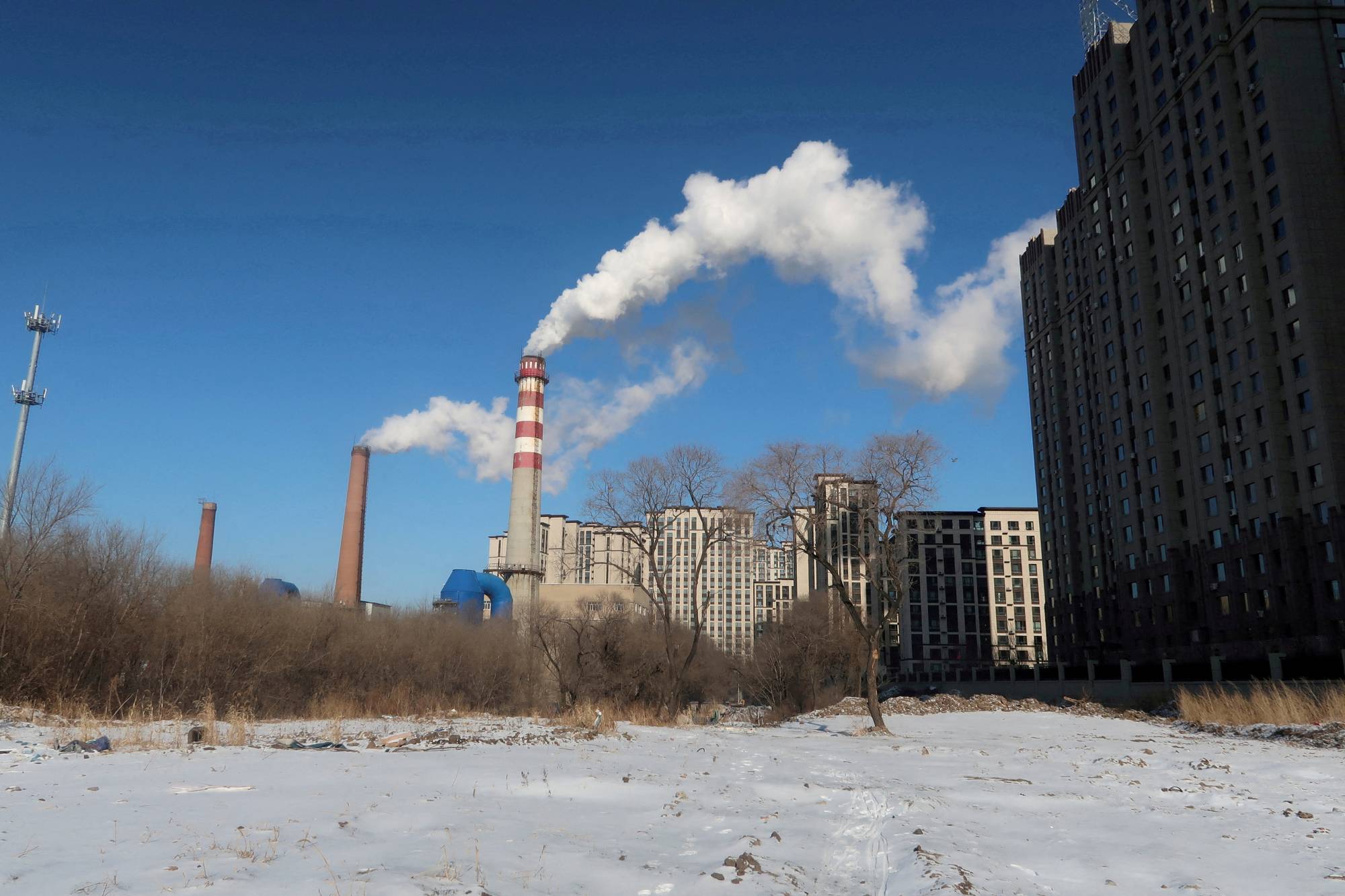 A coal-fired heating complex in Harbin, China, in November 2019 | REUTERS