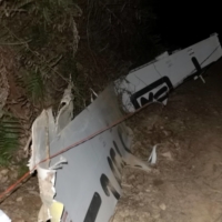 Plane debris at the site where a China Eastern Airlines Boeing 737-800 plane flying from Kunming to Guangzhou crashed, in Wuzhou, China, on Monday. | REUTERS