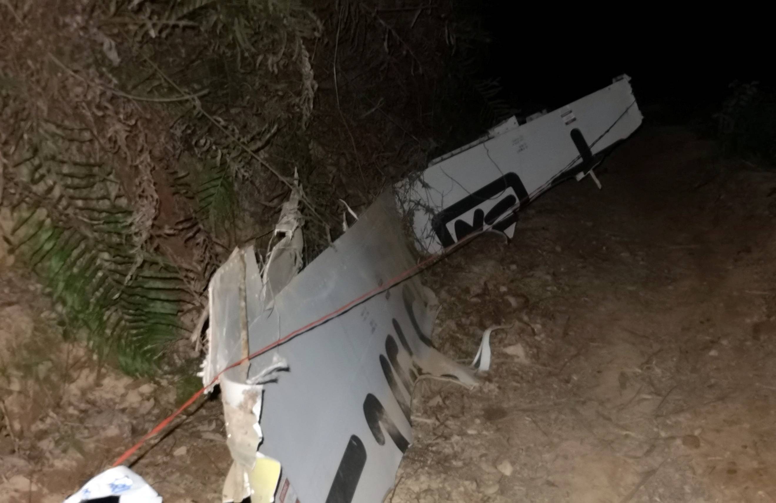 Plane debris at the site where a China Eastern Airlines Boeing 737-800 plane flying from Kunming to Guangzhou crashed, in Wuzhou, China, on Monday. | REUTERS