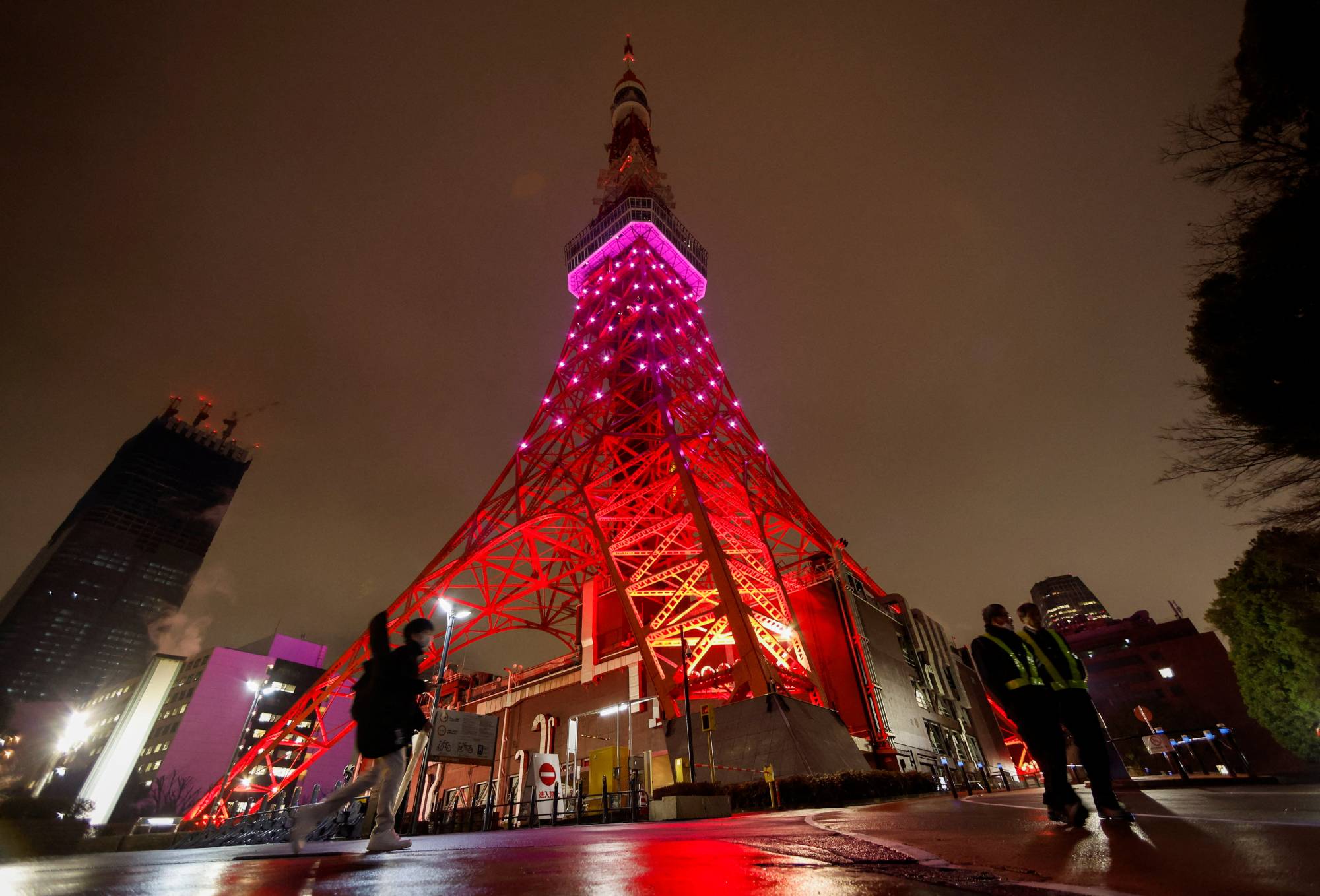 The lower half of Tokyo Tower is illuminated in response to the government's request to save electricity in the Japanese capital on Tuesday. | REUTERS