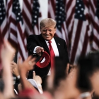 Former U.S. President Donald Trump tosses out MAGA hats and greets attendees during a \'Save America\' Rally at the Lorain County Fairgrounds in Wellington, Ohio, U.S., on Saturday, June 26, 2021.  | BLOOMBERG