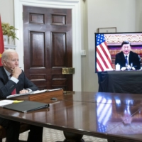 U.S. President Joe Biden listens while meeting virtually with Xi Jinping, China\'s president, in the Roosevelt Room of the White House in Washington, D.C., U.S., on Monday, Nov. 15, 2021. | BLOOMBERG