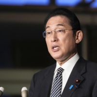 Prime Minister Fumio Kishida speaks to reporters at the Prime Minister\'s Office on Tuesday after securing parliamentary approval of the fiscal 2022 budget. | KYODO