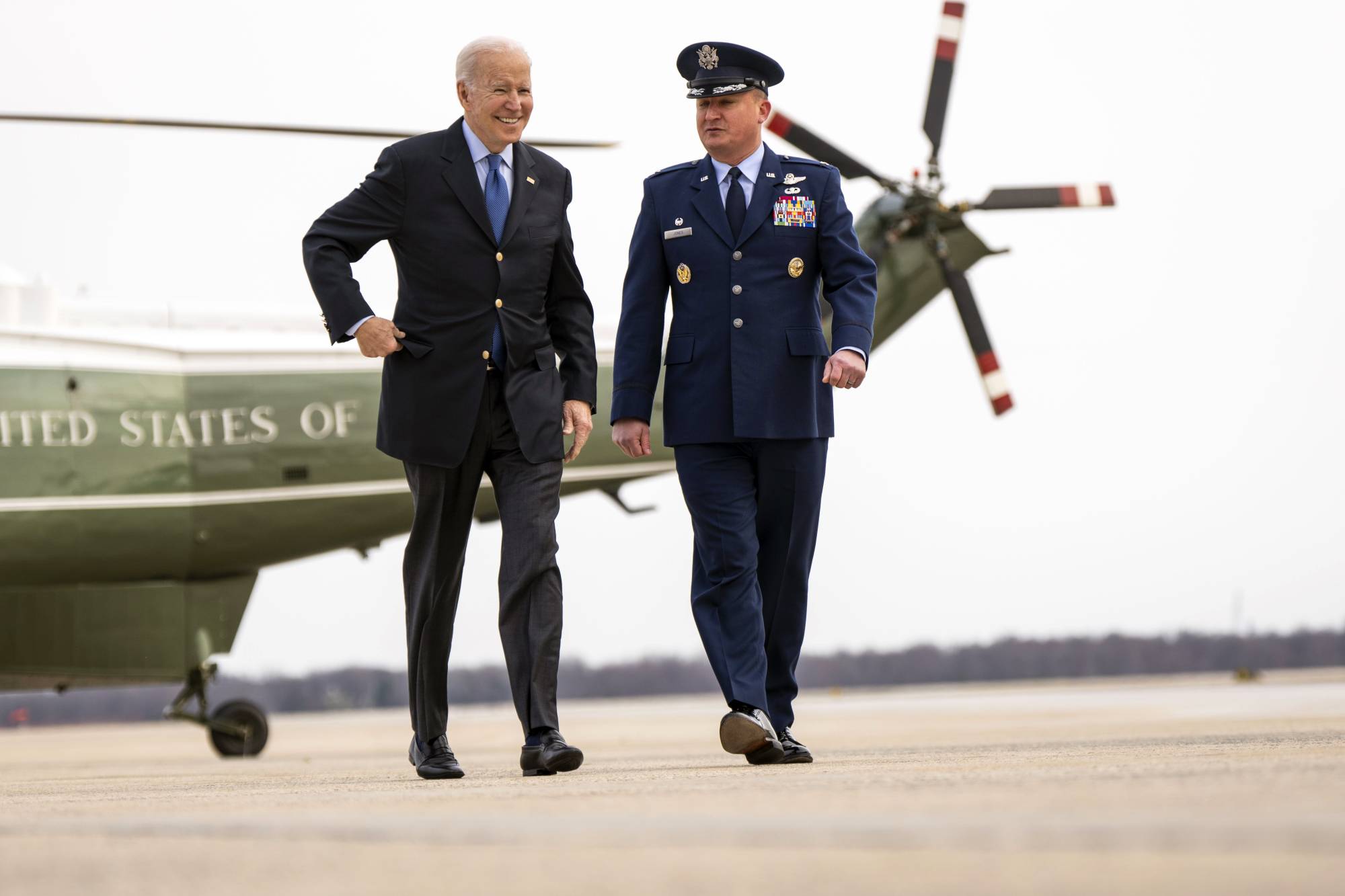 U.S. President Joe Biden stops heads to Air Force One at Joint Base Andrews in Maryland for a trip to Europe on Wednesday morning, March 23, 2022. Biden is to land in Brussels on Wednesday evening and he is set to announce new sanctions on Russian lawmakers before meeting with NATO allies and the European Union before traveling to Poland later in the week.  | DOUG MILLS / THE NEW YORK TIMES