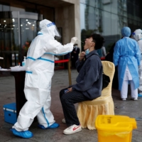 A COVID-19 testing site outside a hotel in Wuzhou, in China\'s Guangxi autonomous region, on Thursday | REUTERS