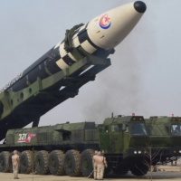 A North Korean Hwasong-17 intercontinental ballistic missile is seen on its launch vehicle in this undated photo released on Friday.  | KCNA / VIA REUTERS
