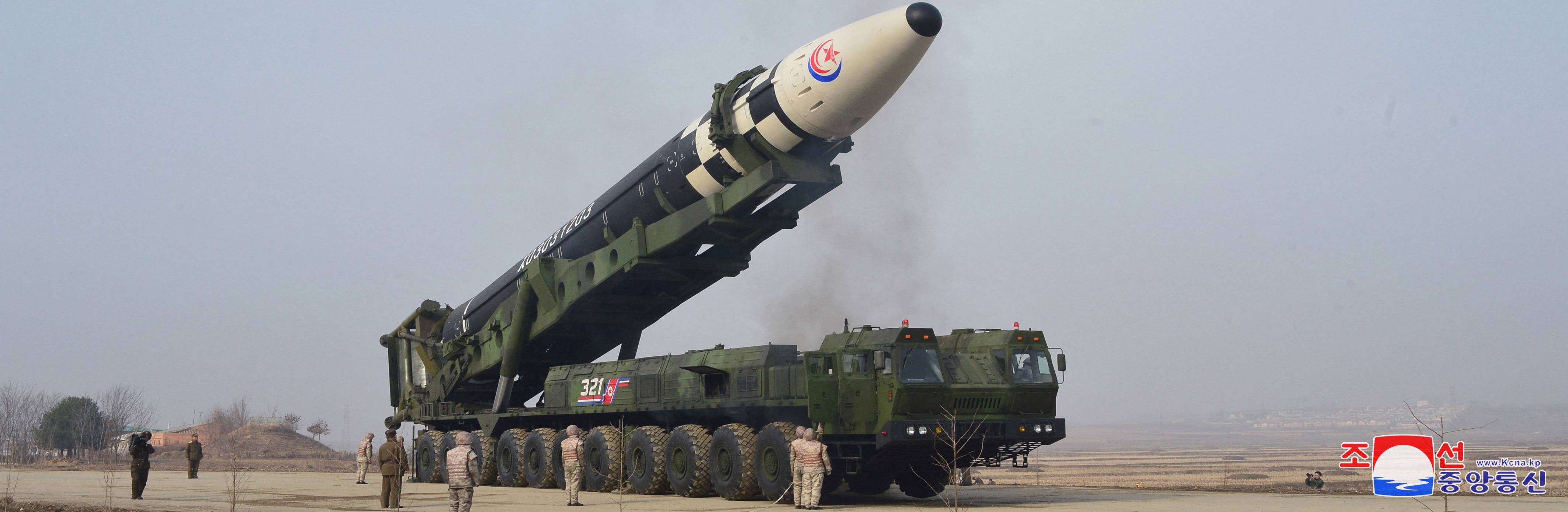 A North Korean Hwasong-17 intercontinental ballistic missile is seen on its launch vehicle in this undated photo released on Friday.  | KCNA / via REUTERS