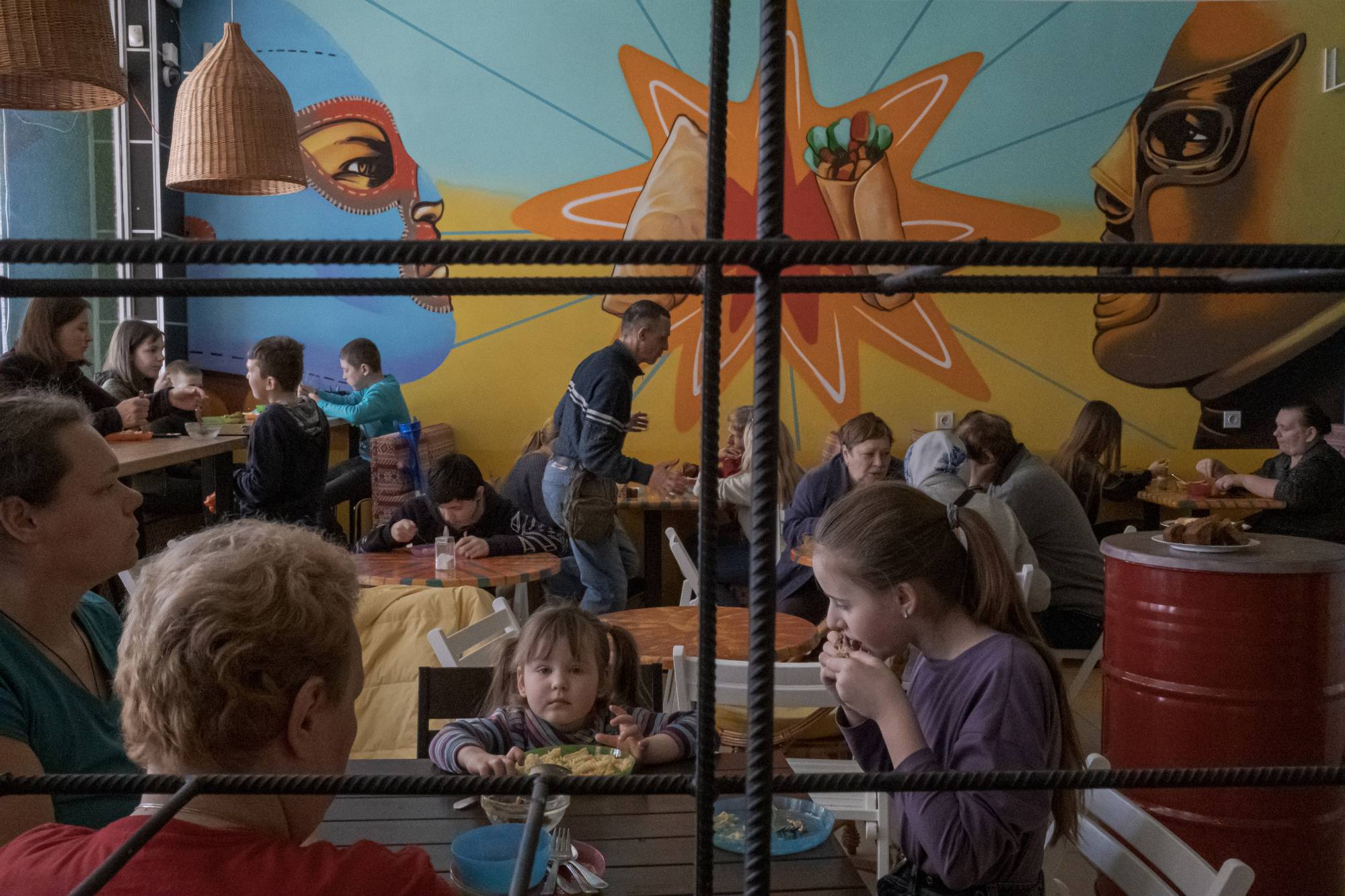 Ukrainian refugees at the Dovzhenka Center, a former cinema and cultural center that now hosts displaced families from Mariupol, in Lviv on Sunday | Mauricio Lima / The New York Times