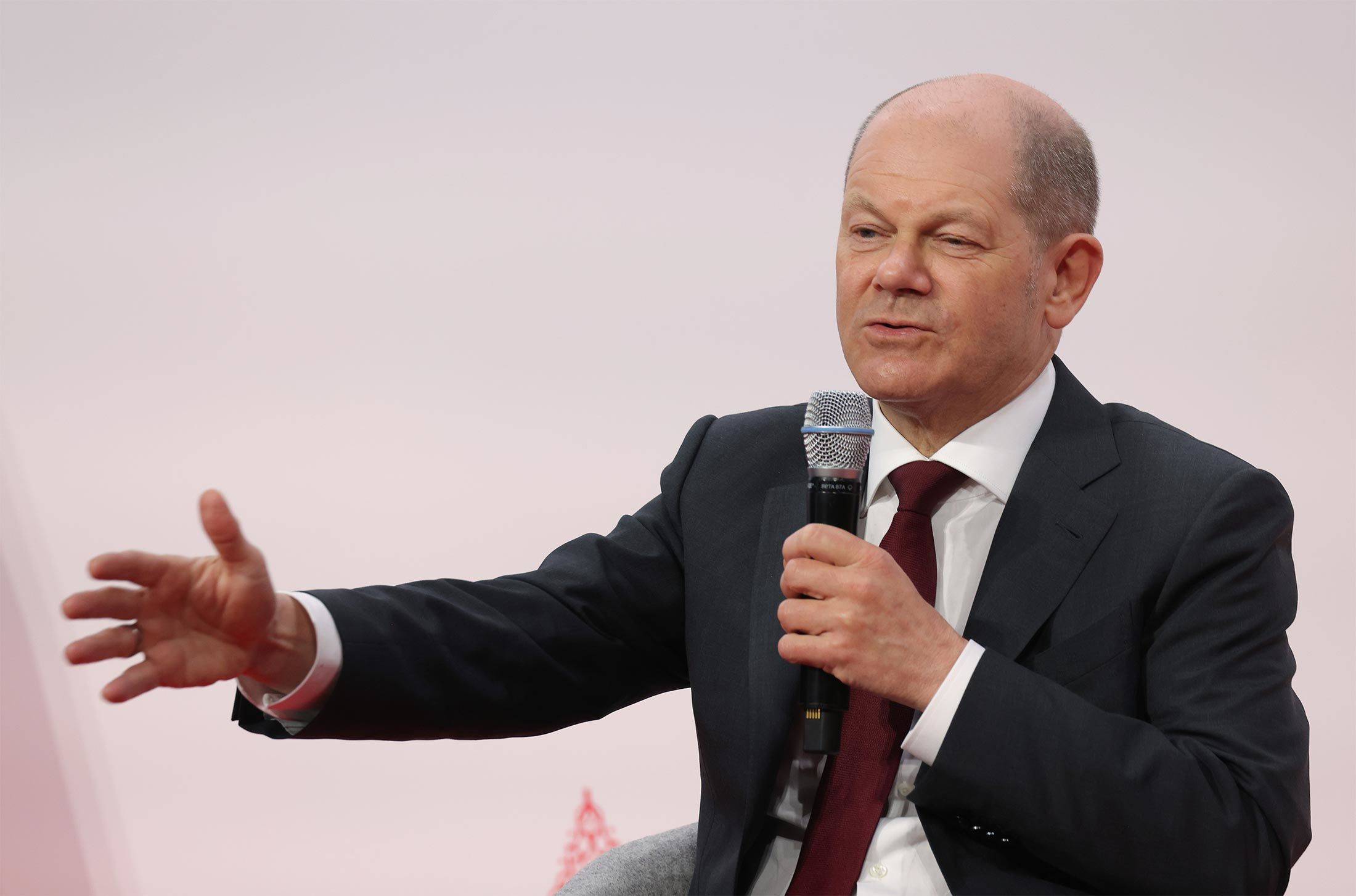 German Channcelor Olaf Scholz speaks at the 2022 Global Solutions summit in Berlin on Monday. | Getty Images / via Bloomberg 