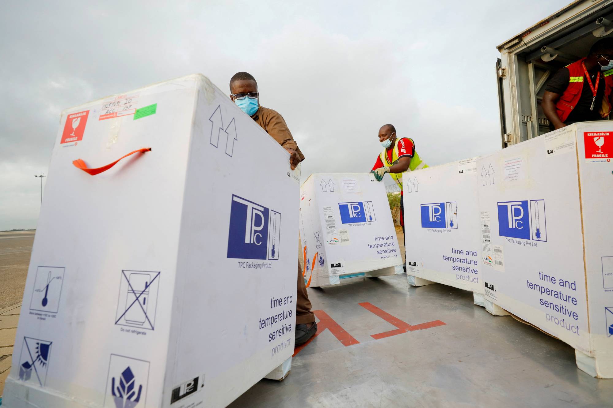 Vaccine doses arrive at Kotoka International Airport in Accra, Ghana, in May 2021. | Reuters 