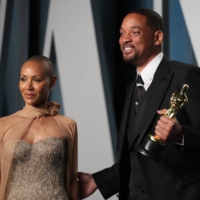 Will Smith and Jada Pinkett Smith arrive at a party in Beverly Hills, California, on Sunday.  | REUTERS 