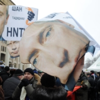 People rally in support of Vladimir Putin, then-Prime Minister of Russia, in Moscow, in February 2012.  | JAMES HILL/THE NEW YORK TIMES