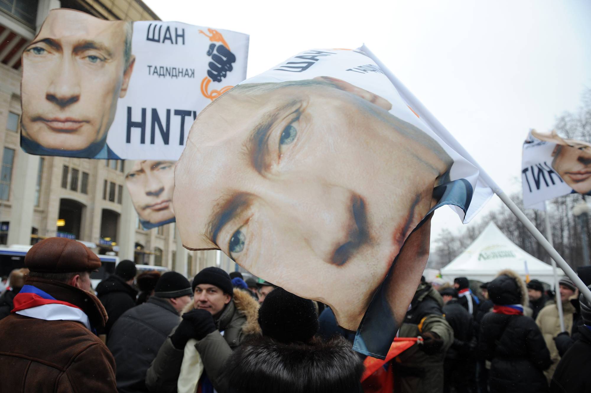 People rally in support of Vladimir Putin, then-Prime Minister of Russia, in Moscow, in February 2012. | James Hill/The New York Times