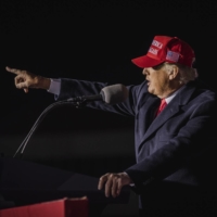 Former U.S. President Donald Trump addresses a campaign-style rally in Commerce, Georgia, on Saturday. | AUDRA MELTON/THE NEW YORK TIMES