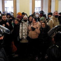 Russian law enforcement officers block demonstrators during an anti-war protest against Russia\'s invasion of Ukraine, in St. Petersburg on March 2. | REUTERS