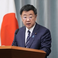 Chief Cabinet Secretary Hirokazu Matsuno speaks during a news conference at the Prime Minister\'s Office on Friday. | KYODO