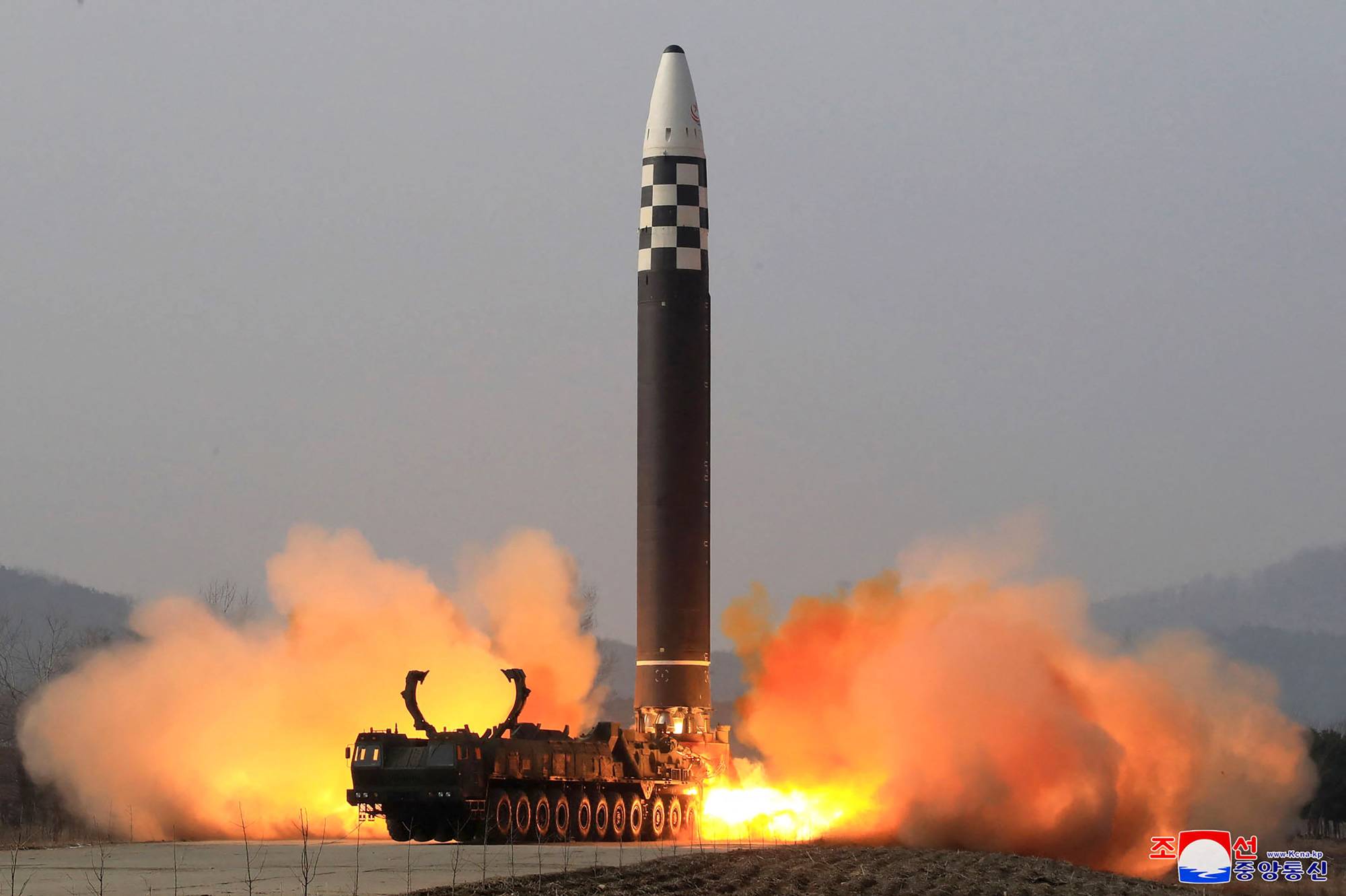 North Korea tests what its state media said was a new type of intercontinental ballistic missile at an undisclosed location on March 24.  | KCNA / KNS / VIA AFP-JIJI  