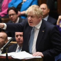 Cuts to free coronavirus testing and contact tracing apps have come as Prime Minister Boris Johnson has called for Britain to \"learn to live with this virus.” | UK PARLIAMENT / VIA REUTERS 