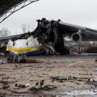 The Antonov An-225 Mriya cargo plane, destroyed by Russian troops, at an airfield in the settlement of Hostomel, in the Kyiv region, on Saturday. | REUTERS