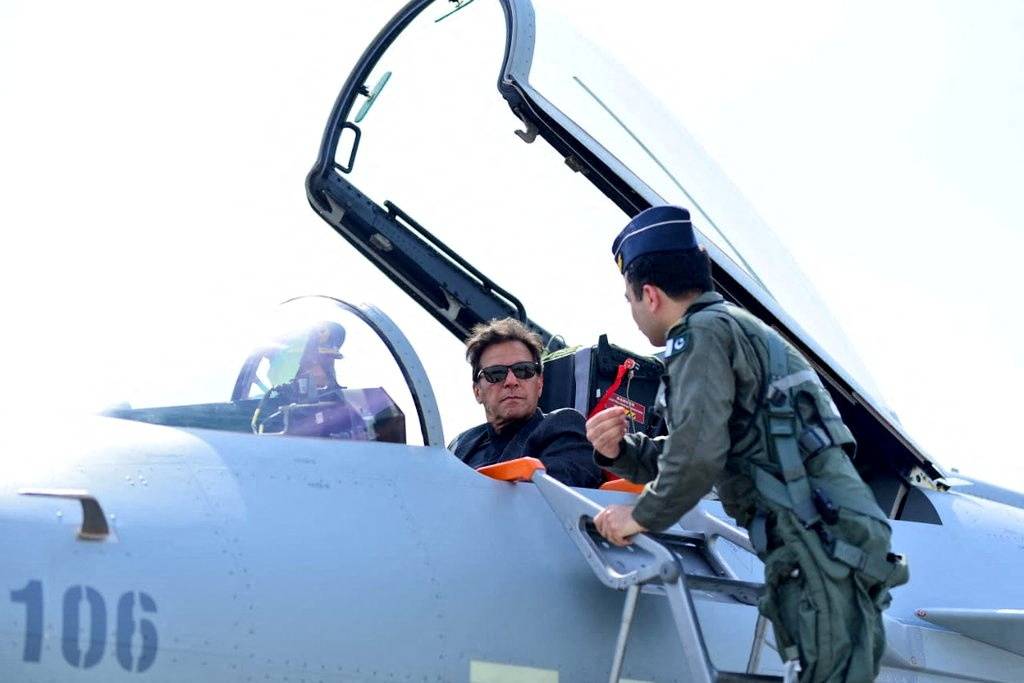 Pakistani Prime Minister Imran Khan sits in the cockpit of a Chinese J-10 C combat aircraft during an induction ceremony at a Pakistan Air Force base in Kamra, Pakistan, on March 11. | PAKISTANI PRIME MINISTER'S OFFICE / VIA REUTERS