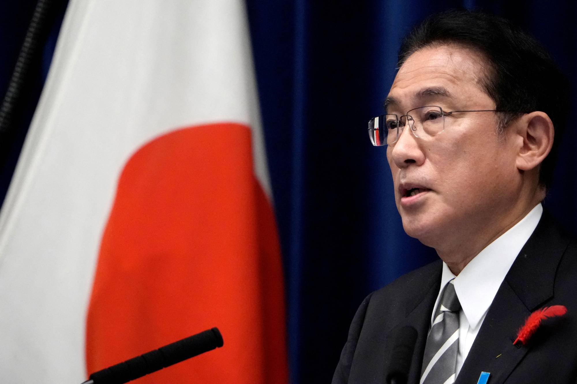 Prime Minister Fumio Kishida speaks during a news conference at the Prime Minister's Office in Tokyo in October. | POOL / VIA REUTERS