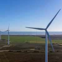 Wind turbines on the Bradwell Wind Farm in the U.K. The IPCC report heralds \"digitalization” — robotics, AI, the internet of things — as a powerful way to increase energy efficiency and manage renewable power. ​​​​​​ | BLOOMBERG
