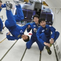 Astronauts for the Japan Aerospace Exploration Agency go through training in May 2010. | JAXA / NASA / VIA KYODO