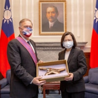 Taiwan\'s President Tsai Ing-wen meets with Mike Pompeo in Taipei on March 3. The former U.S. Secretary of State used the visit to call for the opening of diplomatic relations between the island and the United States. | TAIWAN PRESIDENTIAL OFFICE / VIA REUTERS