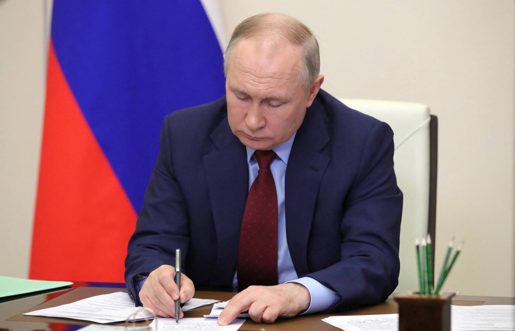 The United States and its allies have created a multinational task force to track and seize assets of at least 50 wealthy Russians, including Russian President Vladimir Putin, and have announced rewards for information that helps in the effort. | KREMLIN / VIA REUTERS