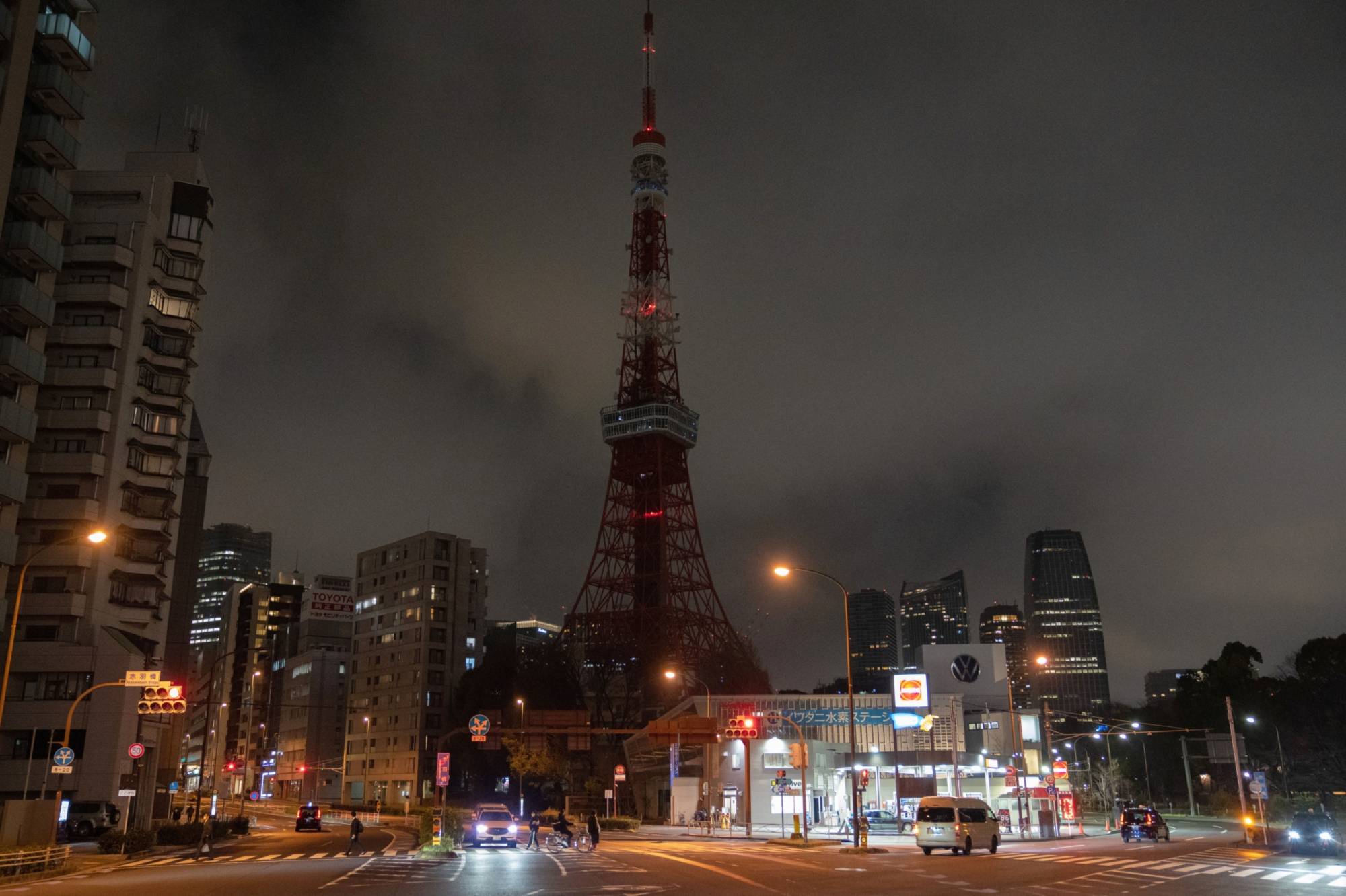 Tokyo Tower is unlit after the Tokyo Metropolitan Government turned off its lights to conserve energy on March 22. | BLOOMBERG