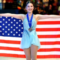 American figure skater Alysa Liu celebrates after winning bronze at the world championships in Montpellier, France, on March 25. | AFP-JIJI