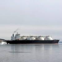 A Japanese-made liquefied natural gas (LNG) carrier is anchored near an LNG plant on Sakhalin island, Russia, in February 2009. | REUTERS