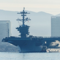 The USS Abraham Lincoln aircraft carrier, seen in San Diego in January, is currently operating in waters off the Korean Peninsula. | REUTERS