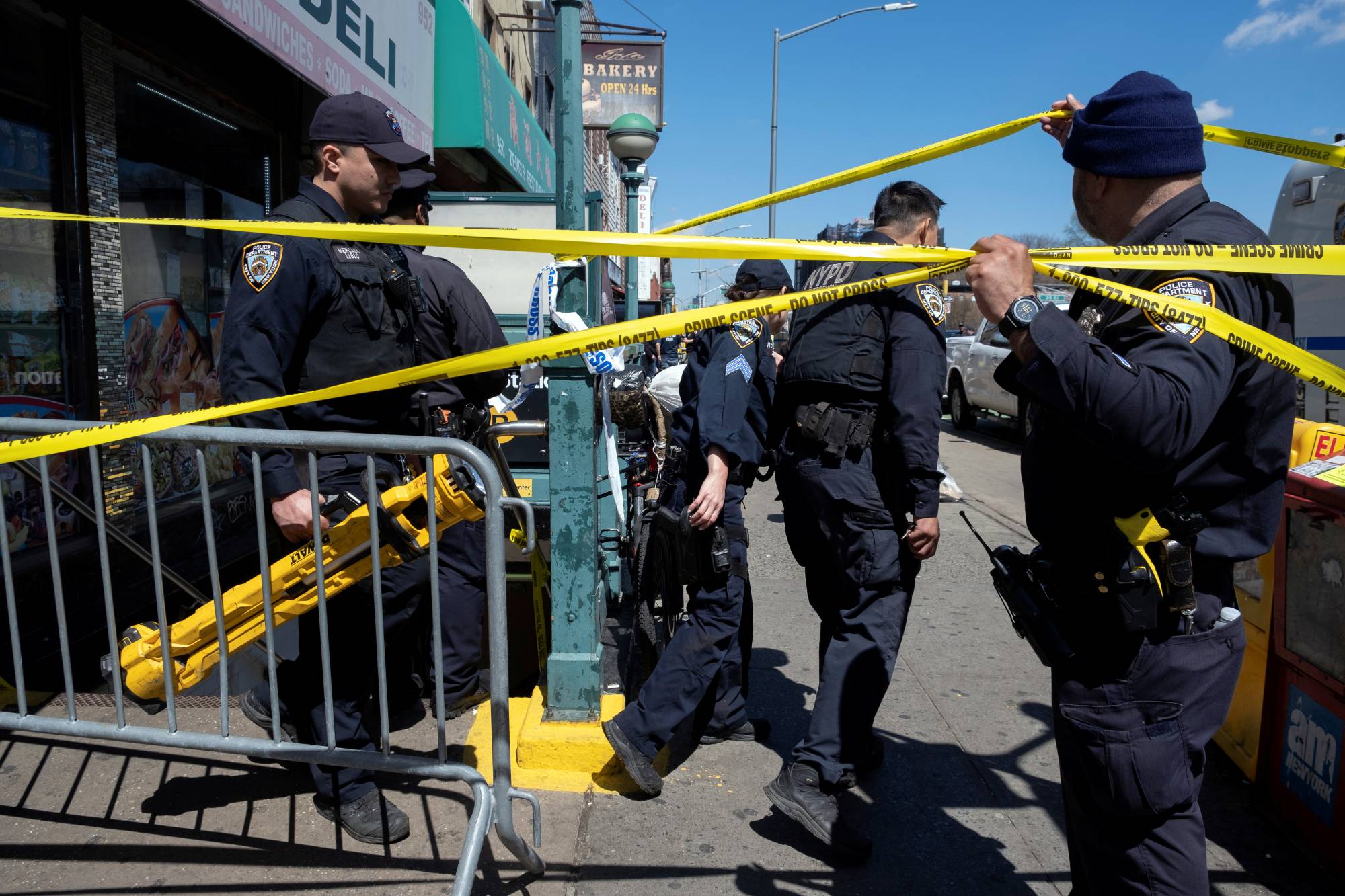 Police on the scene after a shooting inside a Brooklyn subway station on Tuesday | Dakota Santiago / The New York Times
