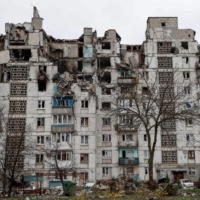 A residential building damaged in the course of Russia\'s war on Ukraine in the southern port city of Mariupol, Ukraine, on Wednesday. | REUTERS