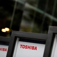 Talks of going private loom at Toshiba Corp. after failing to win shareholders\' approval for its plan to split. | REUTERS